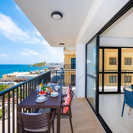 Islet Promenade Seafront With Large Corner Terrace By Getawaysmalta *