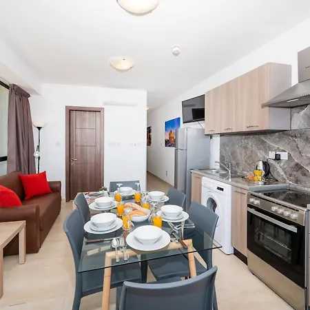 Islet Promenade Seafront With Large Corner Terrace By Getawaysmalta