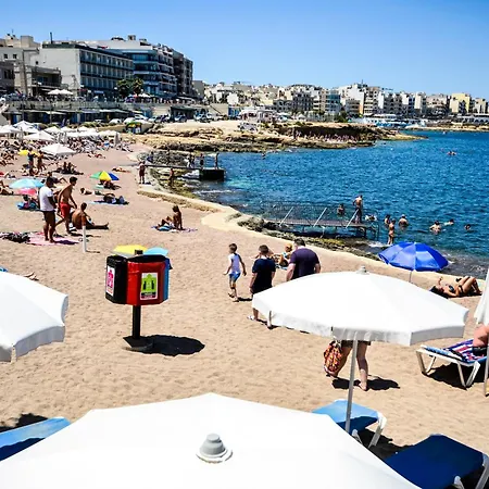 Islet Promenade Seafront With Large Corner Terrace By Getawaysmalta *