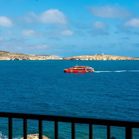 Apartment Islet Promenade Seafront With Large Corner Terrace By Getawaysmalta