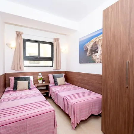 Apartment Islet Promenade Seafront With Large Corner Terrace By Getawaysmalta *