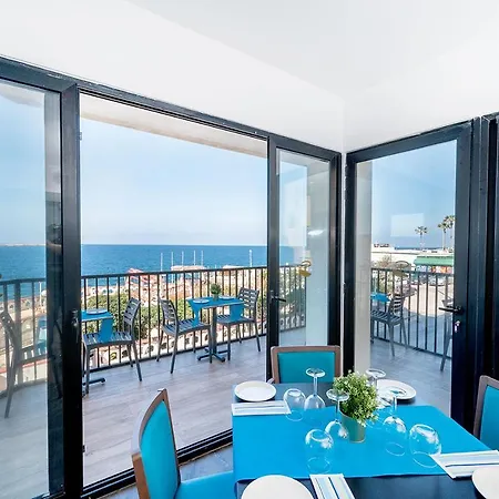 Islet Promenade Seafront With Large Corner Terrace By Getawaysmalta * St. Paul's Bay