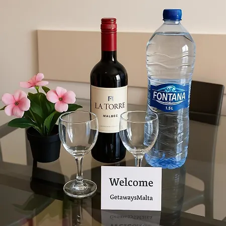 Islet Promenade Seafront With Large Corner Terrace By Getawaysmalta Daire *