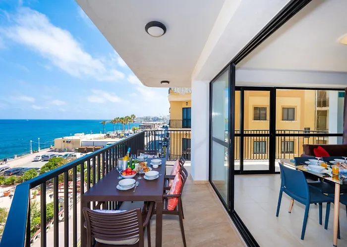 Islet Promenade Seafront With Large Corner Terrace By Getawaysmalta *