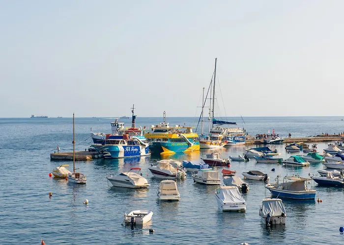 Islet Promenade Seafront With Large Corner Terrace By Getawaysmalta *