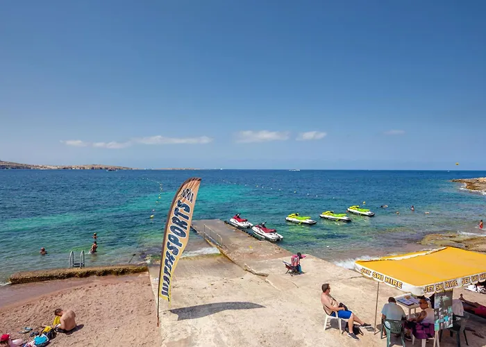Islet Promenade Seafront With Large Corner Terrace By Getawaysmalta *