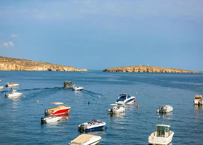 Islet Promenade Seafront With Large Corner Terrace By Getawaysmalta