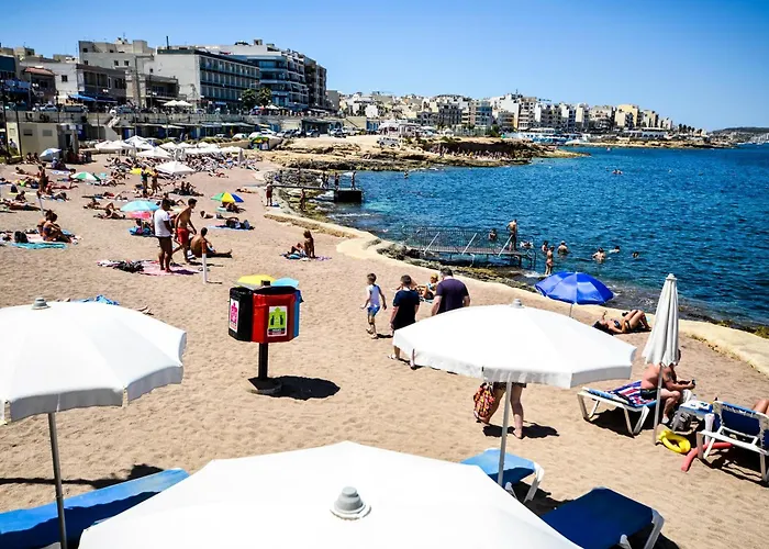 Islet Promenade Seafront With Large Corner Terrace By Getawaysmalta *