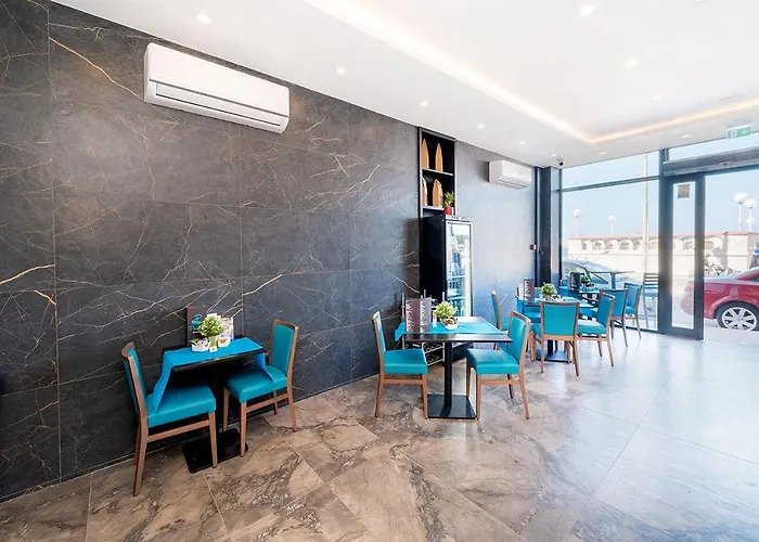 Islet Promenade Seafront With Large Corner Terrace By Getawaysmalta Apartman