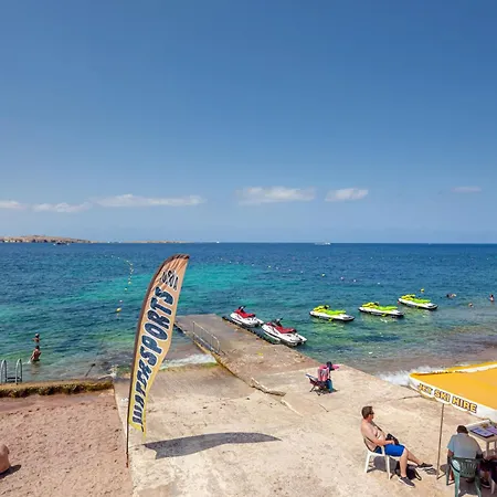Islet Promenade Seafront With Large Corner Terrace By Getawaysmalta *
